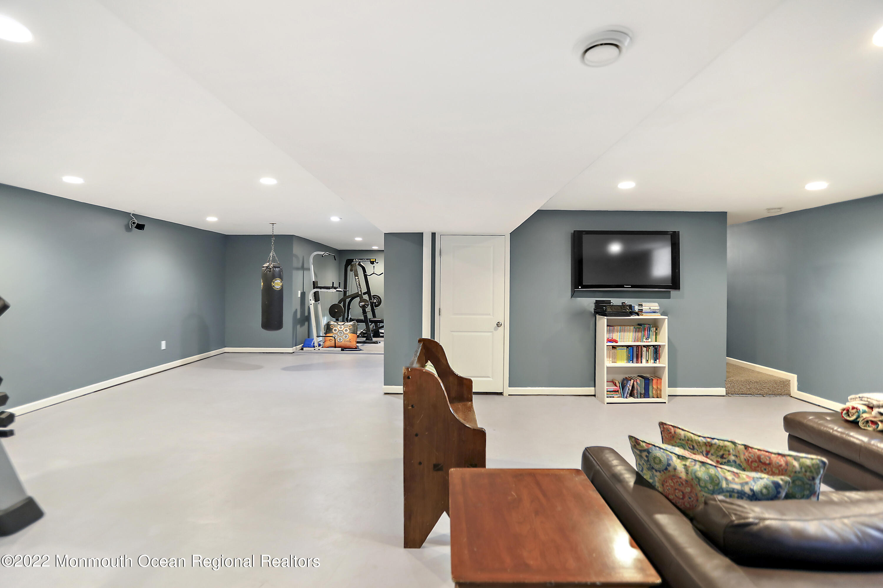 1849 Carmerville Road Wall, NJ 07719 - Photo 35 of 45 a living room with furniture and a flat screen tv
