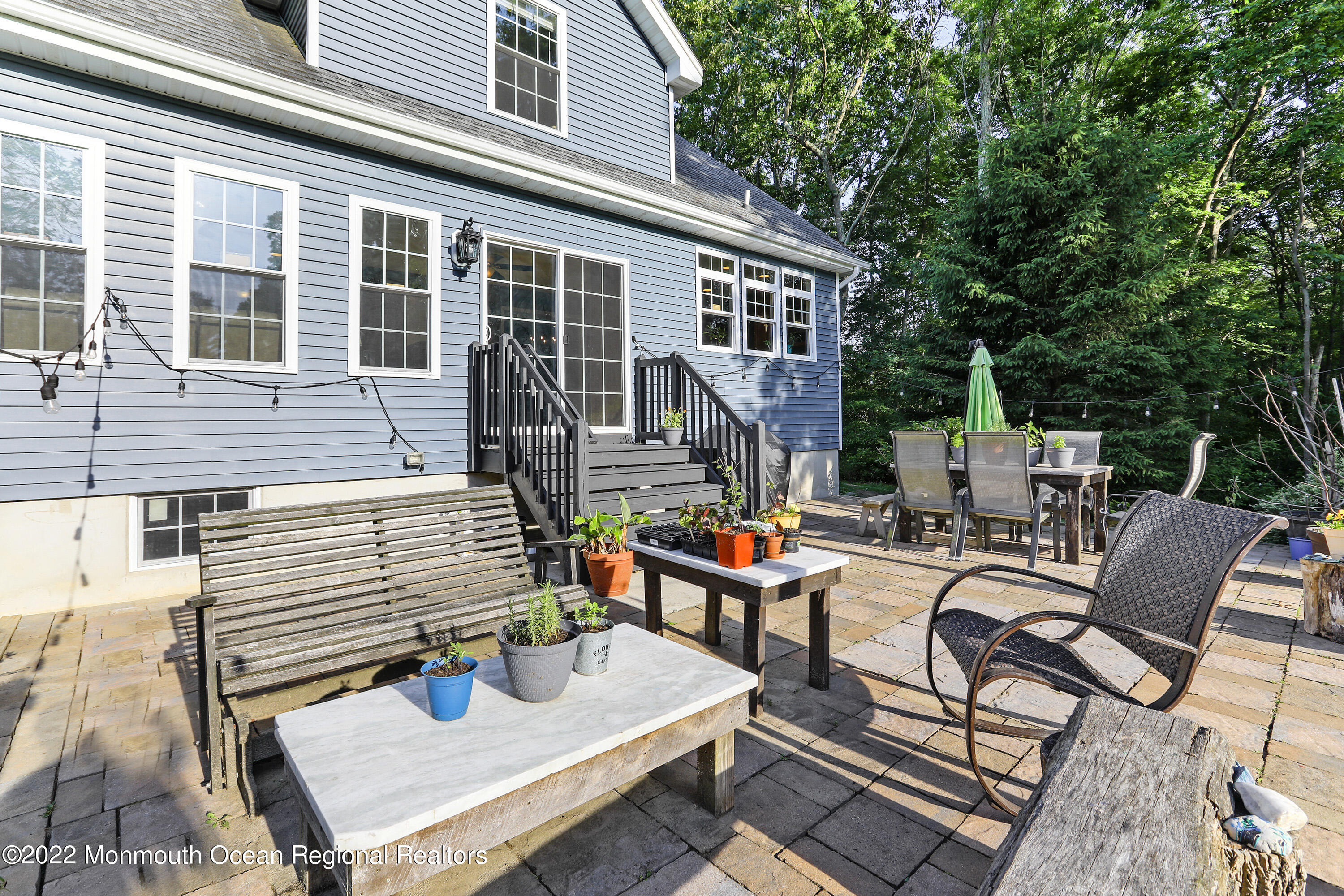 1849 Carmerville Road Wall, NJ 07719 - Photo 40 of 45 a view of a patio with couple of chairs and a table