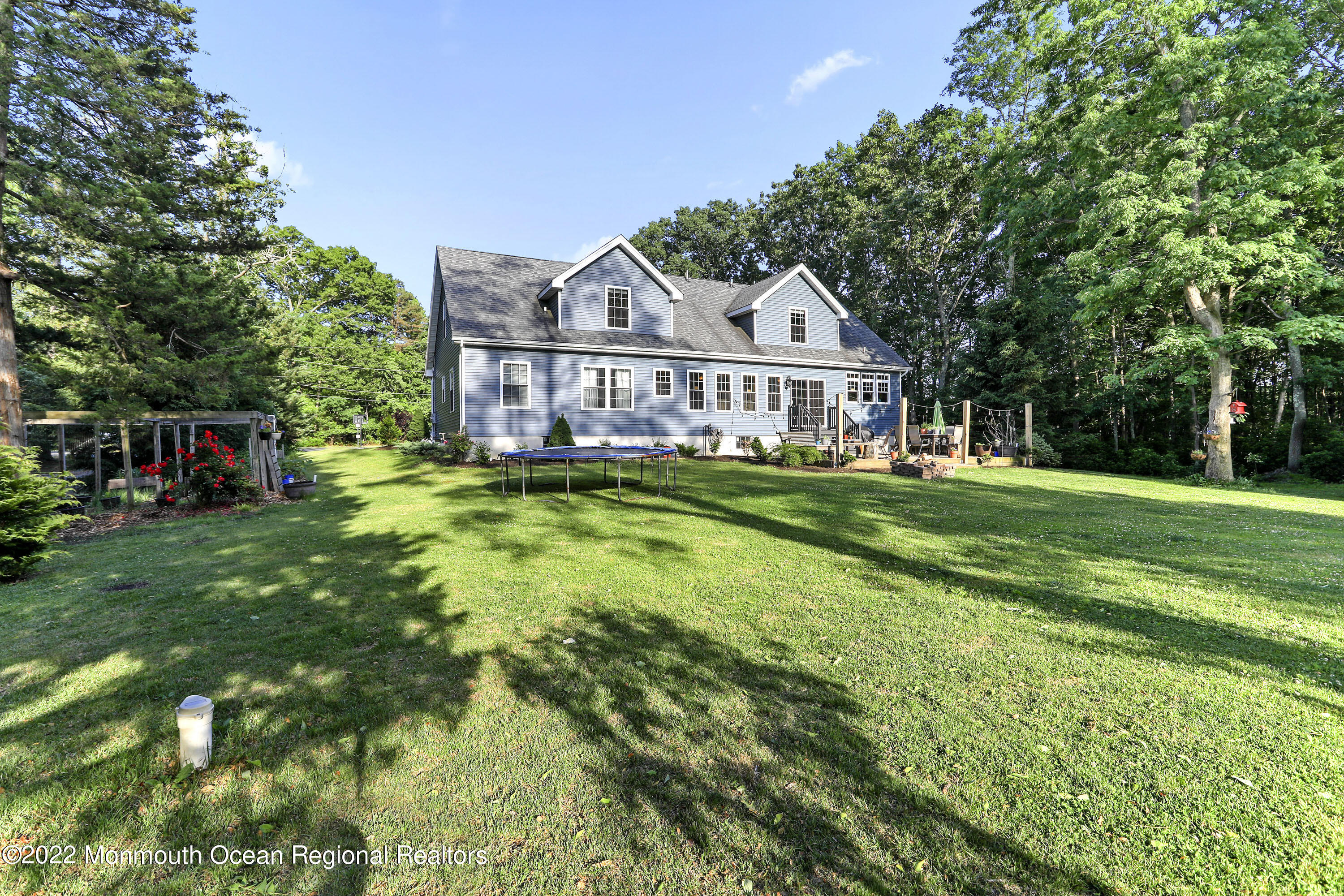 1849 Carmerville Road Wall, NJ 07719 - Photo 41 of 45 a view of a house with a big yard and large trees