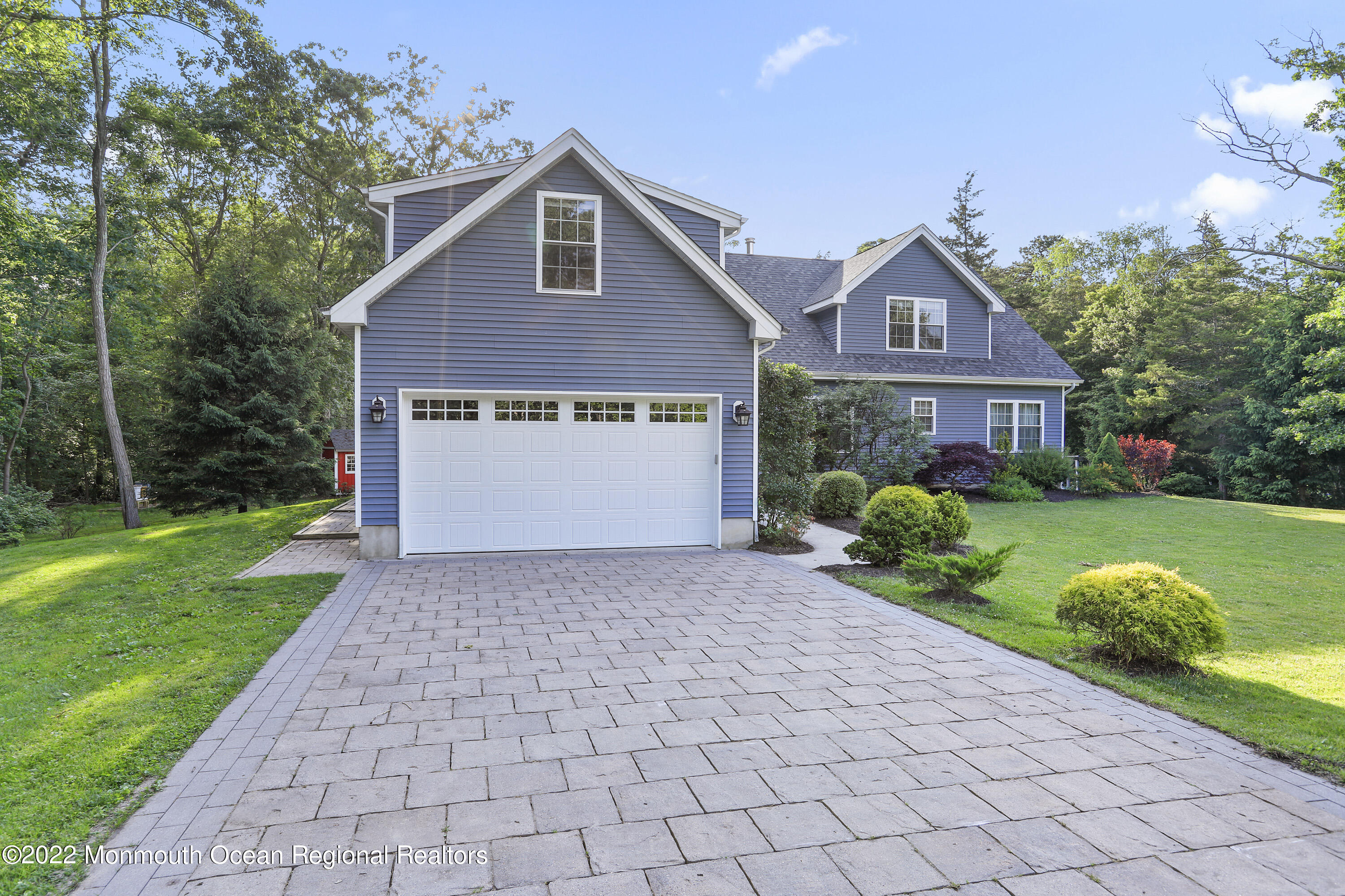 1849 Carmerville Road Wall, NJ 07719 - Photo 5 of 45 a front view of a house with a yard