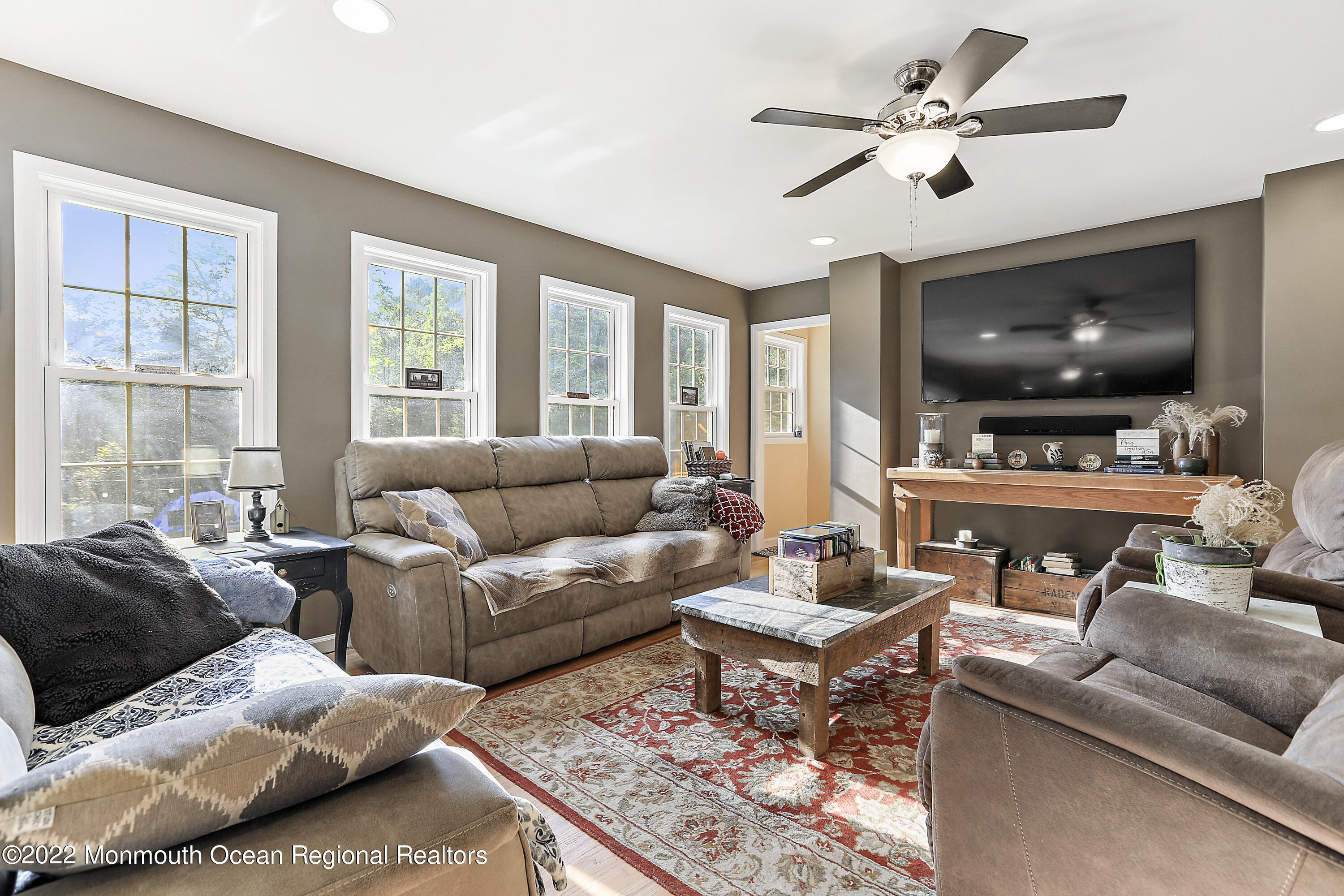 1849 Carmerville Road Wall, NJ 07719 - Photo 9 of 45 a living room with furniture and a flat screen tv