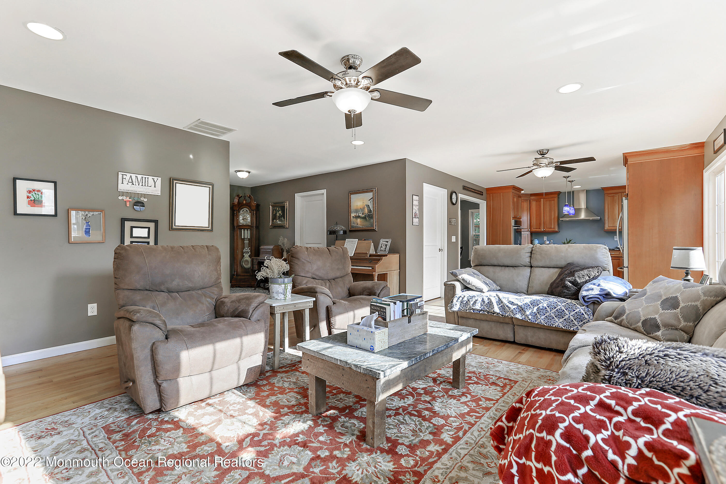 1849 Carmerville Road Wall, NJ 07719 - Photo 10 of 45 a living room with furniture ceiling fan and a rug