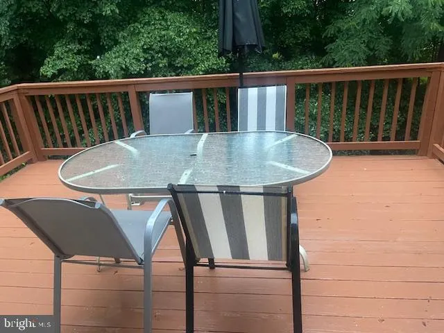 a view of balcony with furniture