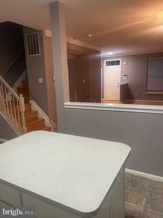 a view of a hallway with entryway