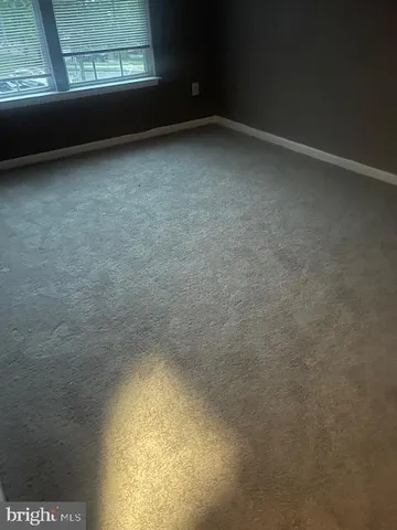 a view of empty room with a window