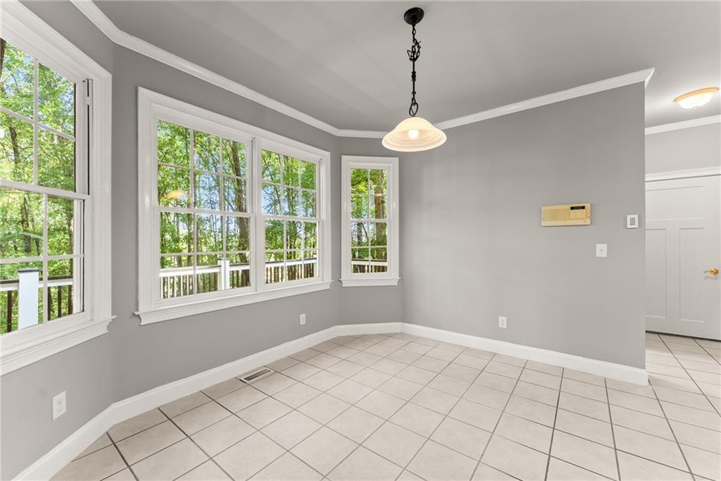 1040 Auburn Road Dacula, GA 30019 - Photo 15 of 65 a view of an empty room with a window