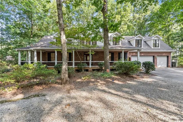 a front view of a house with yard