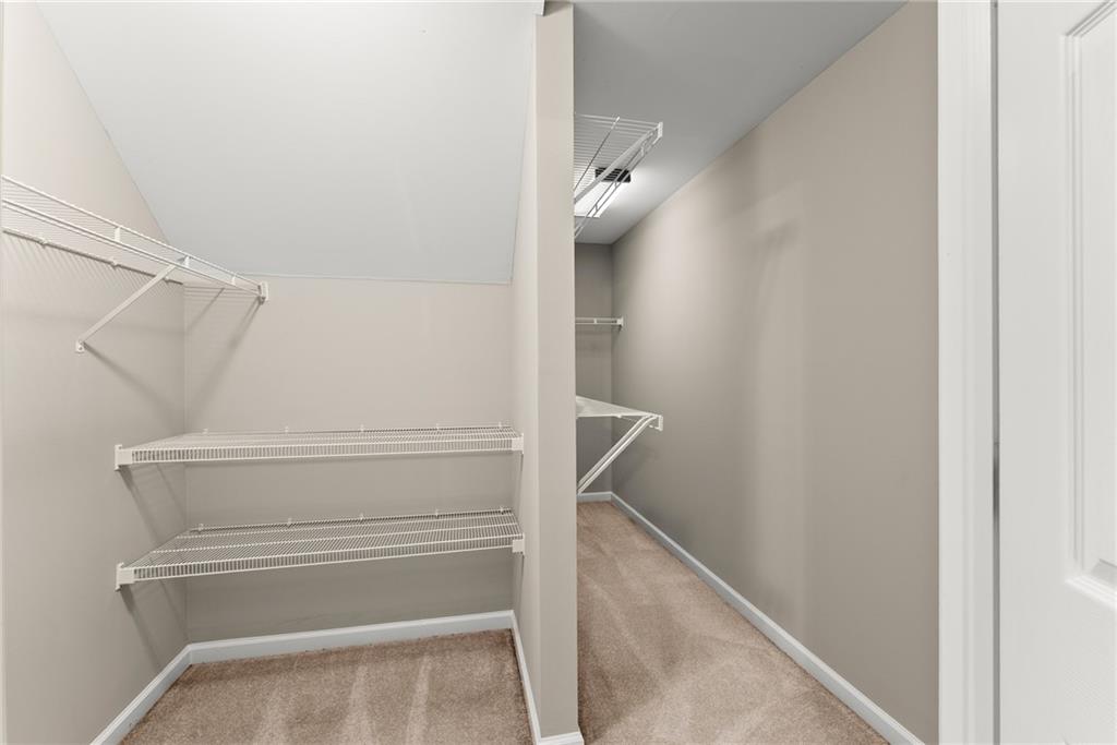 1040 Auburn Road Dacula, GA 30019 - Photo 38 of 65 a view of walk in closet