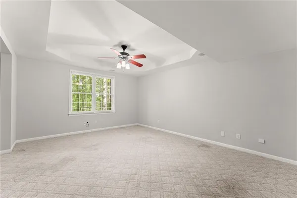 a black and white photo of a living room