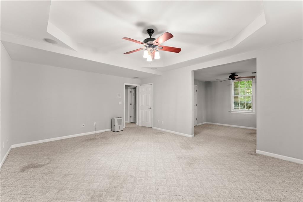 1040 Auburn Road Dacula, GA 30019 - Photo 51 of 65 a view of an empty room with a window