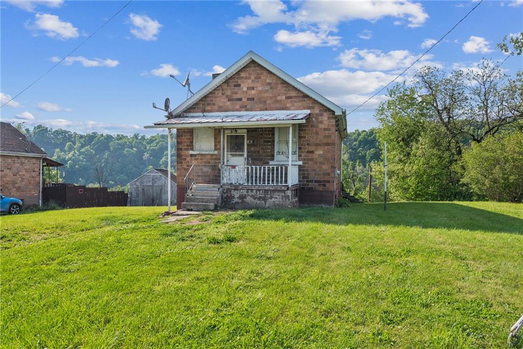 375 Reduction Road Smithton, PA 15479 - Photo 18 of 30 a front view of a house with a garden