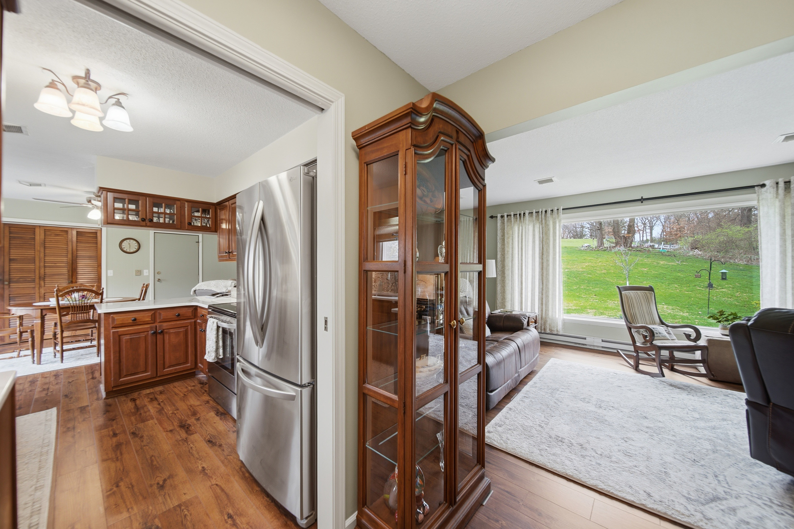 476 Timberland Drive Dixon, IL 61021 - Photo 12 of 32 a kitchen with stainless steel appliances granite countertop a refrigerator and a stove