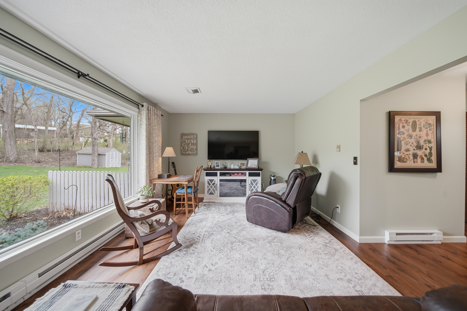 476 Timberland Drive Dixon, IL 61021 - Photo 13 of 32 a living room with furniture and a flat screen tv