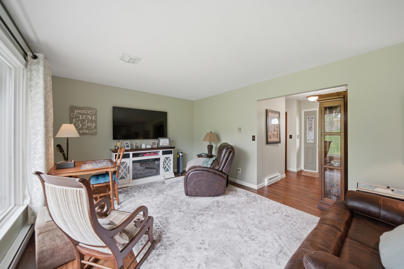 476 Timberland Drive Dixon, IL 61021 - Photo 14 of 32 a living room with furniture and a flat screen tv