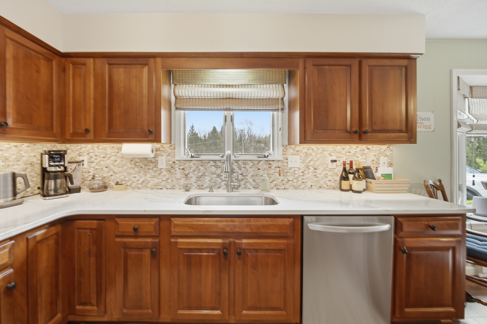 476 Timberland Drive Dixon, IL 61021 - Photo 17 of 32 a kitchen with stainless steel appliances granite countertop a sink stove and cabinets