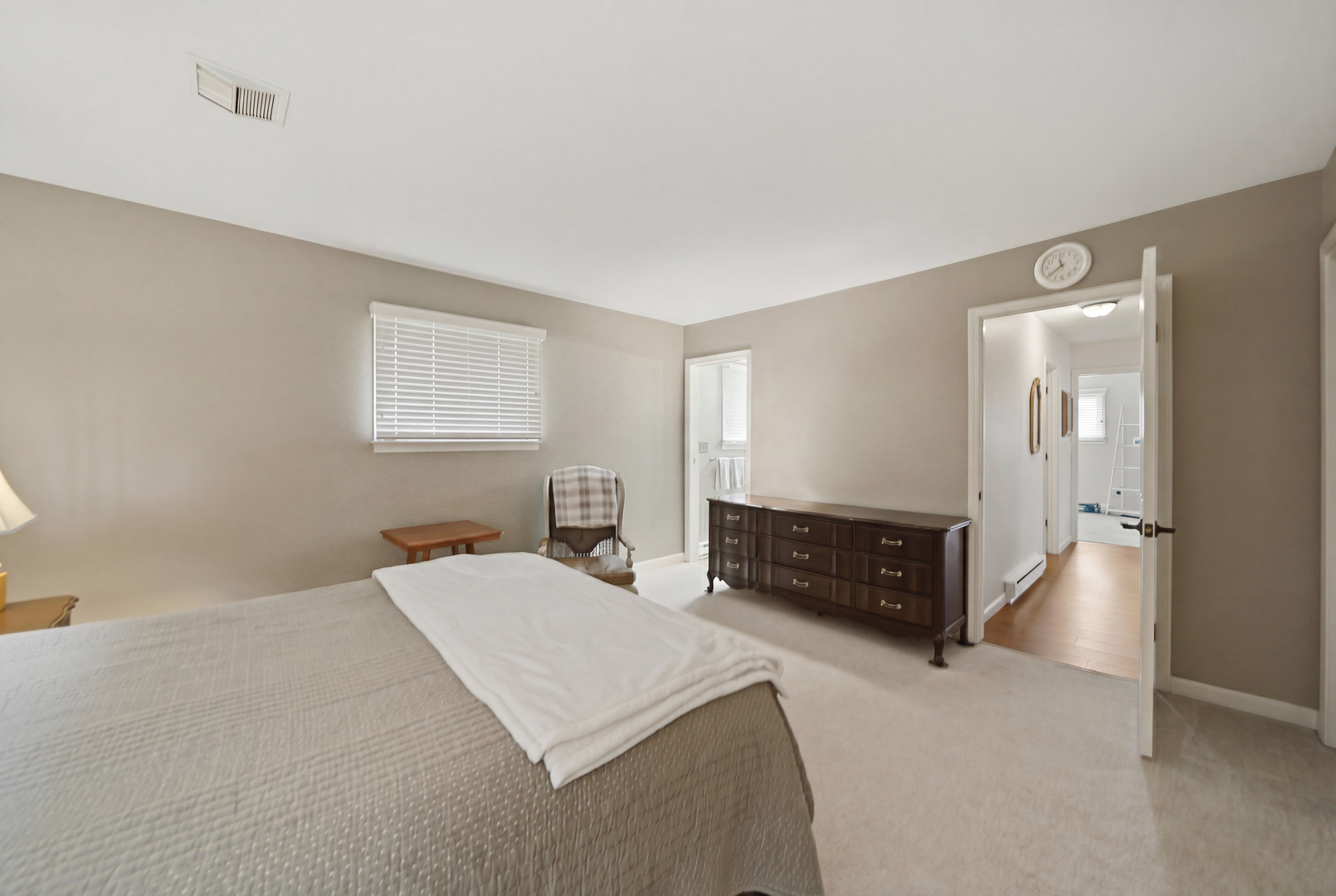 476 Timberland Drive Dixon, IL 61021 - Photo 27 of 32 a large bedroom with a bed and a dresser in it