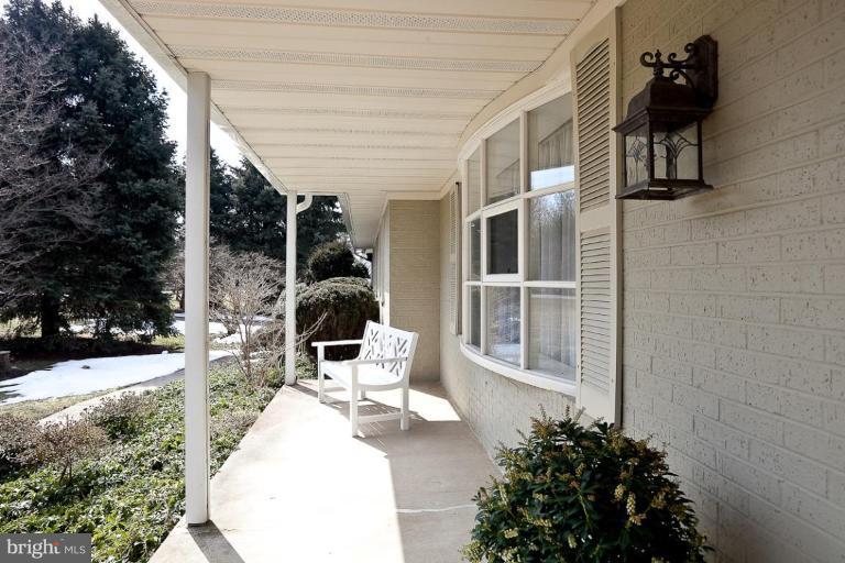 1828 Ridge Road Reisterstown, MD 21136 - Photo 22 of 27 a view of a patio with table and chairs and potted plants