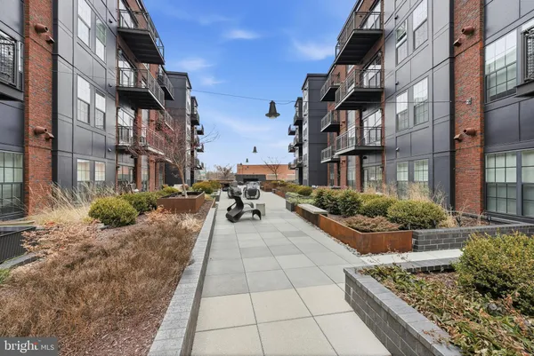 a view of a pathway both side of building