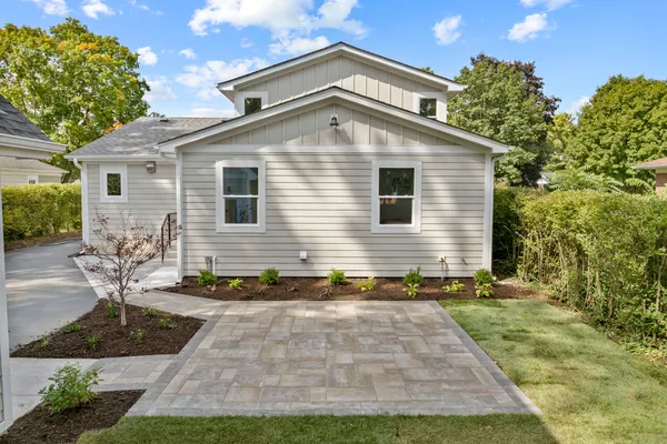 a front view of a house with yard