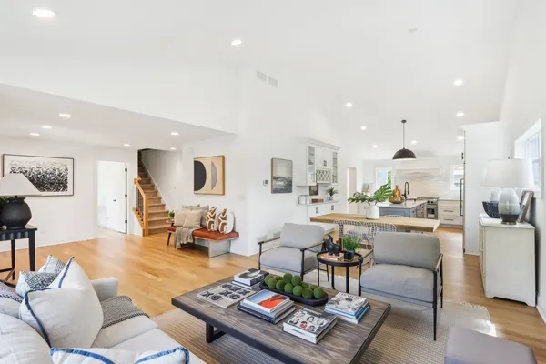 a living room with furniture and a table