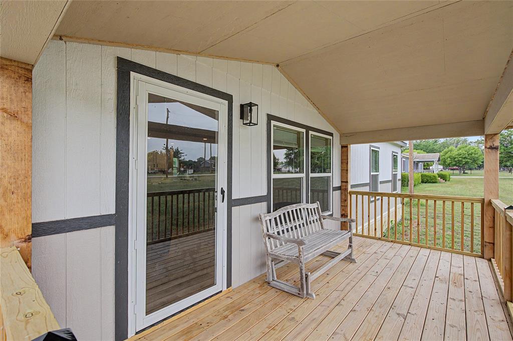 6065 Timber Trail Azle, TX 76020 - Photo 8 of 33 a view of a balcony with chair