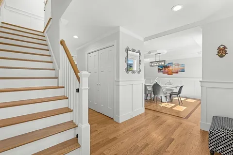 a view of a living room and entryway