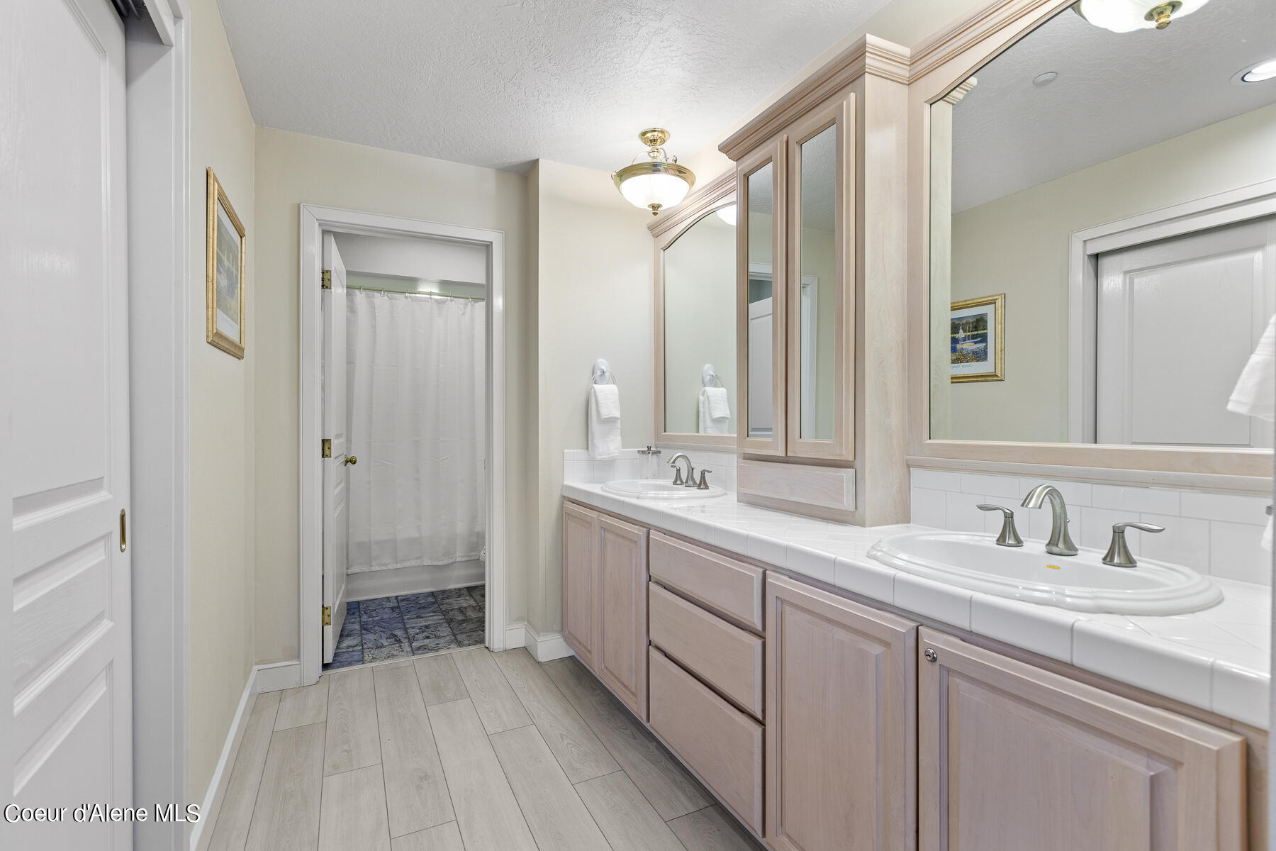4732 South Arrow Point Drive, Unit 101 Harrison, ID 83833 - Photo 12 of 31 ArrowPoint Principle Bathroom