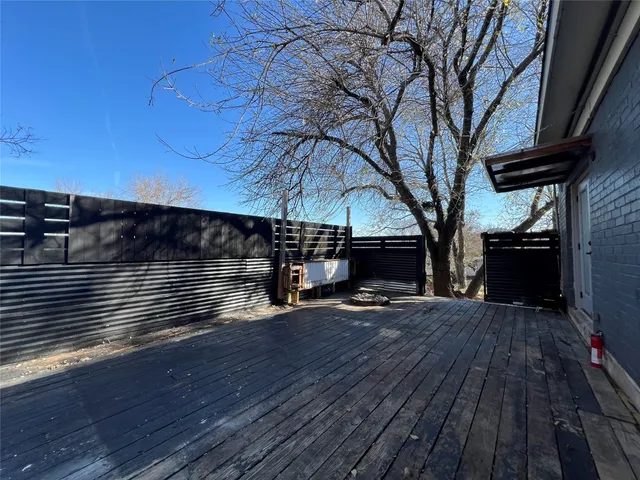 a view of house with outdoor space and wooden floor