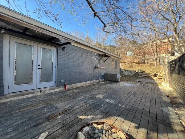a view of a backyard of a house