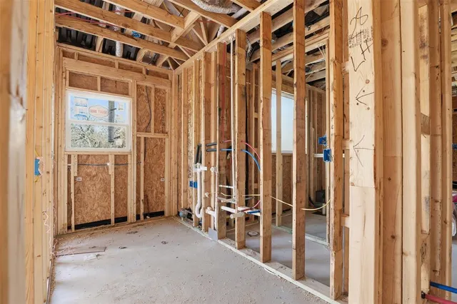 a view of a porch with wooden floor and stairs