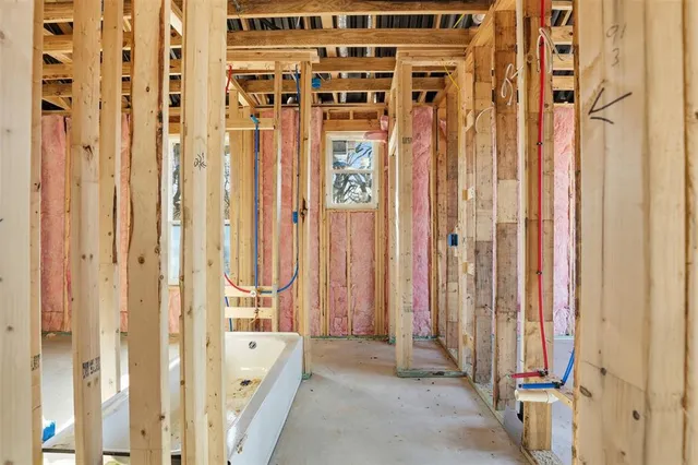 a view of a hallway with windows