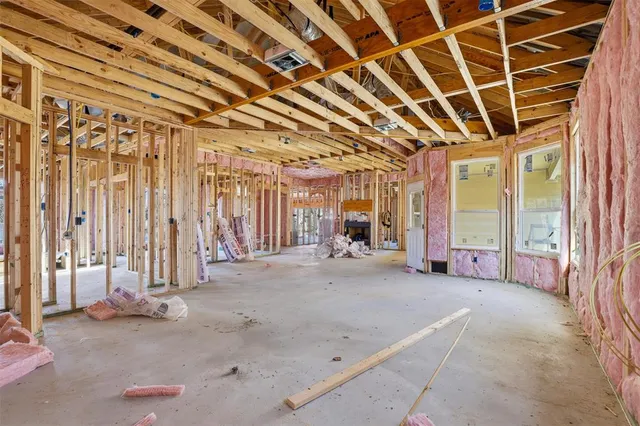 a view of a room with wooden walls