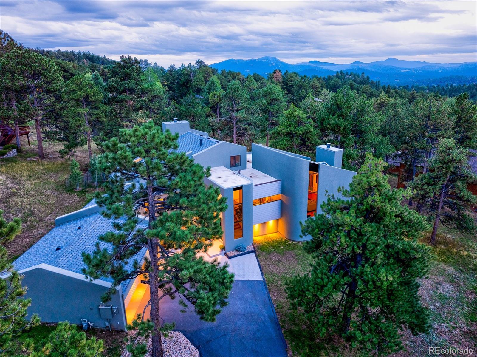 2040 Werner Lane Evergreen, CO 80439 - Photo 3 of 47 an aerial view of a house with a garden