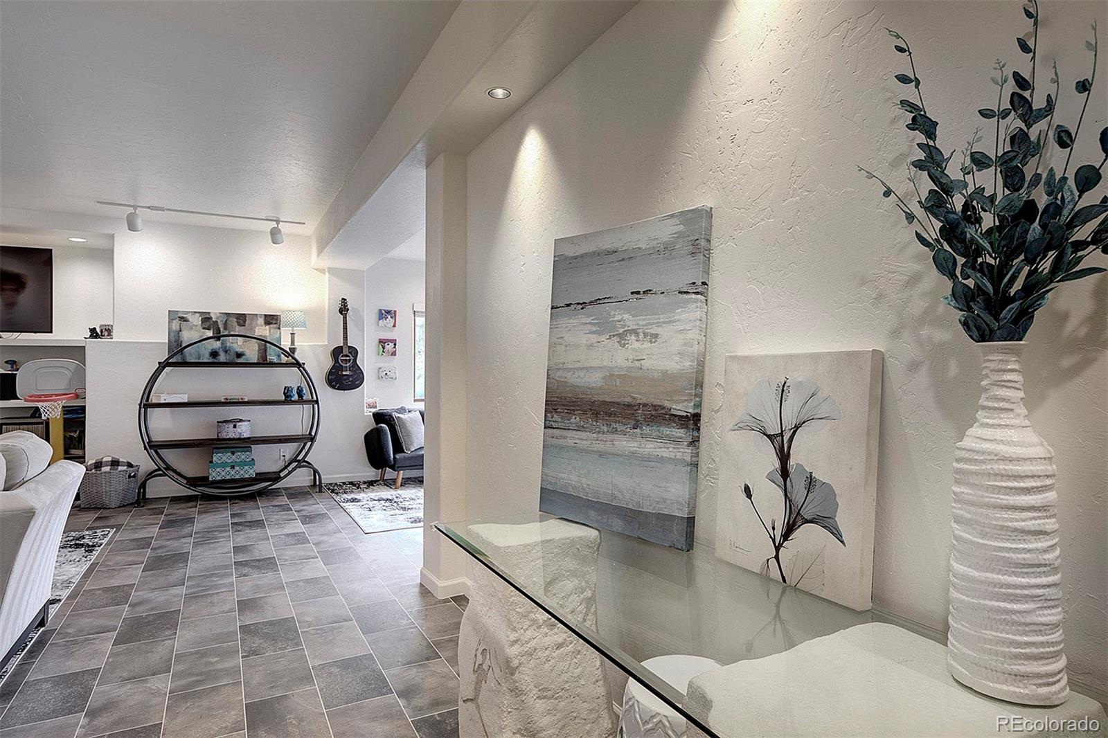 2040 Werner Lane Evergreen, CO 80439 - Photo 34 of 47 a lobby with furniture and a rug