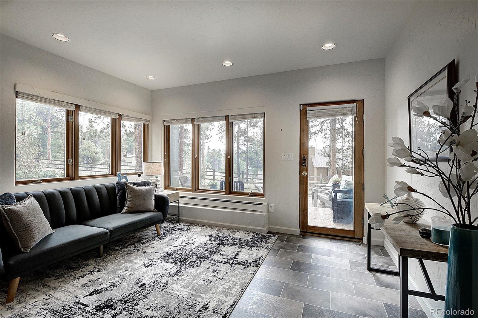 2040 Werner Lane Evergreen, CO 80439 - Photo 36 of 47 a living room with furniture and a large window