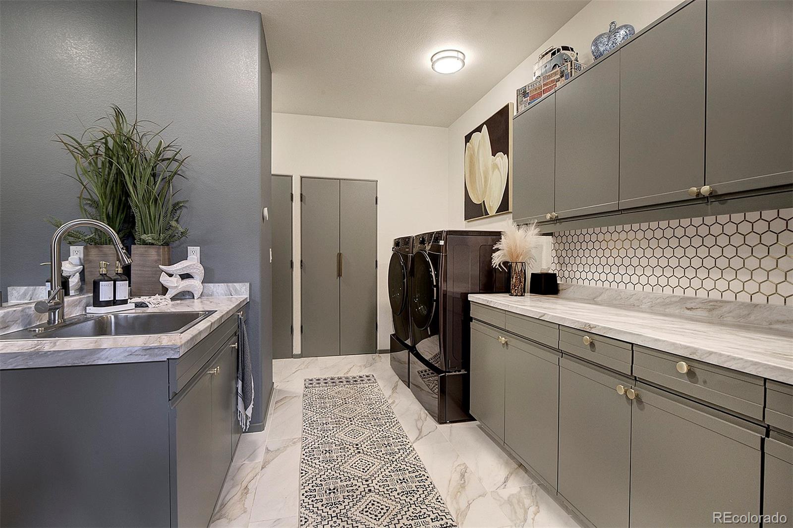 2040 Werner Lane Evergreen, CO 80439 - Photo 41 of 47 a kitchen with a sink appliances and cabinets