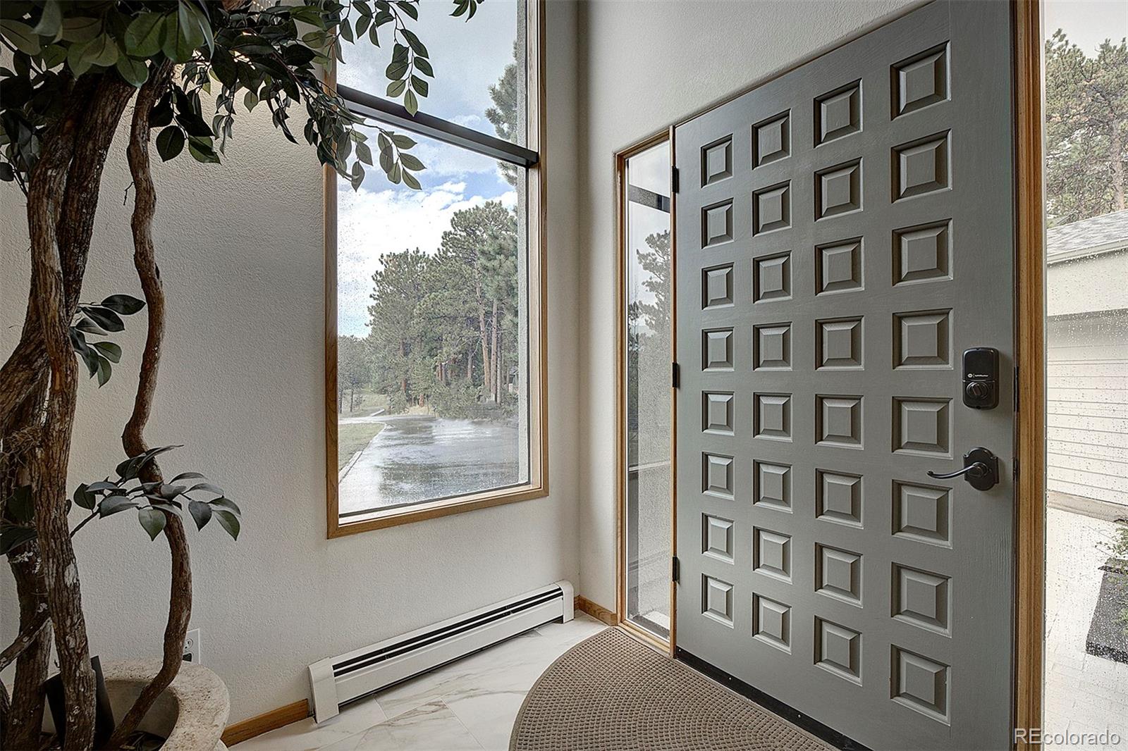 2040 Werner Lane Evergreen, CO 80439 - Photo 6 of 47 a view of a balcony and a window
