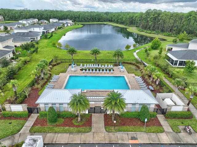 a kitchen with a sink cabinets and stainless steel appliances