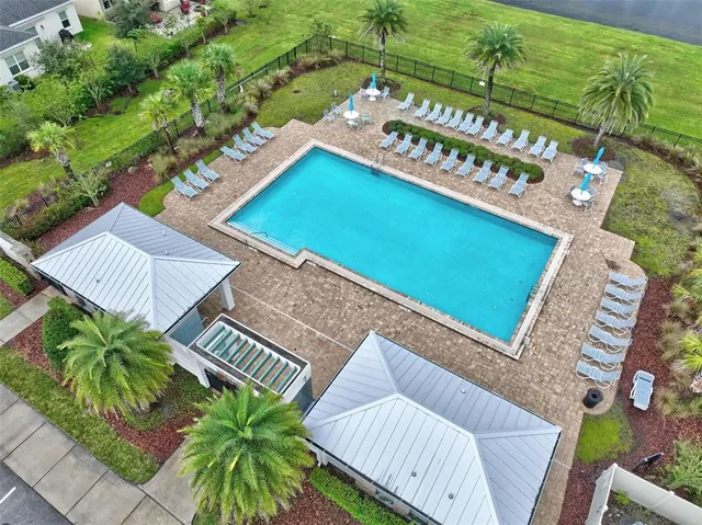 a kitchen with stainless steel appliances granite countertop a sink and a stove