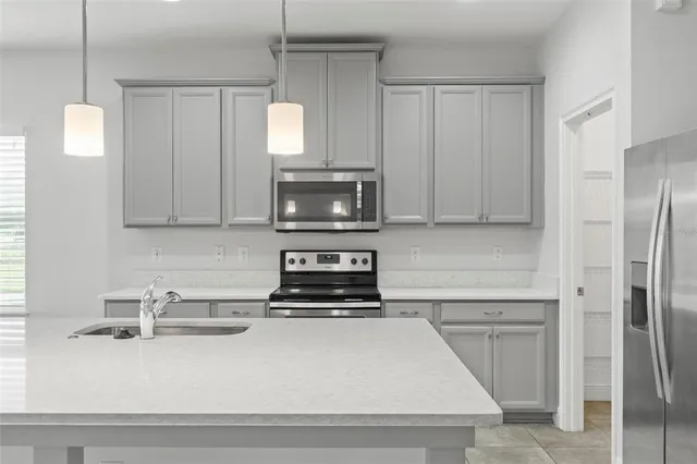a view of a kitchen with a sink