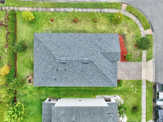 a view of a garden with an outdoor space
