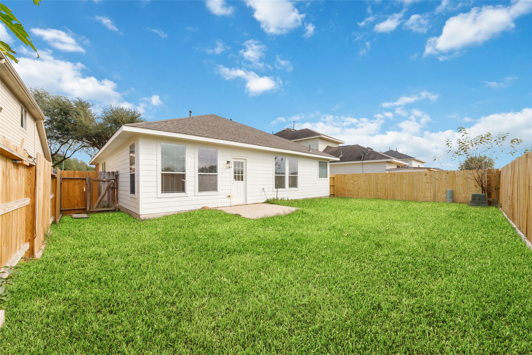 20215 Enchanted Rose Cypress, TX 77433 - Photo 23 of 24 a view of a house with backyard and garden