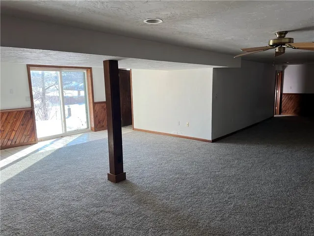 a view of a livingroom with a staircase