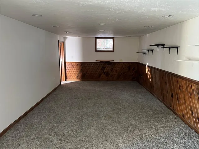 a view of hallway with windows