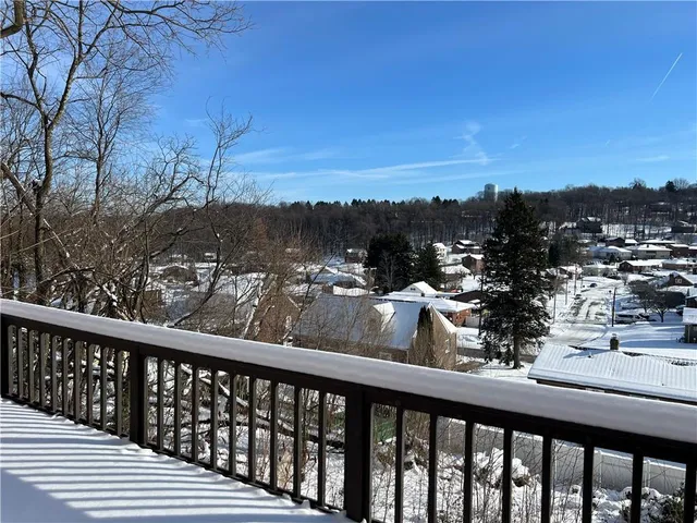 a view of a city from a balcony