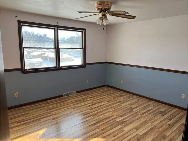 an empty room with a window