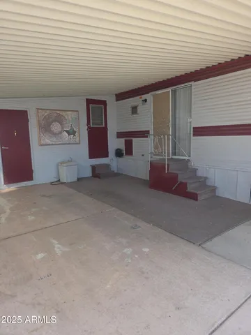 a spacious bedroom with a bed and a window
