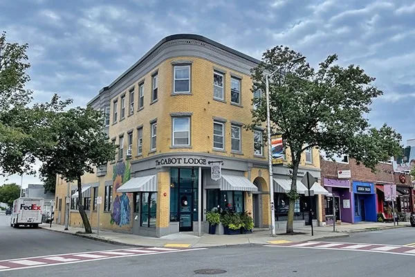 a front view of a building and a street