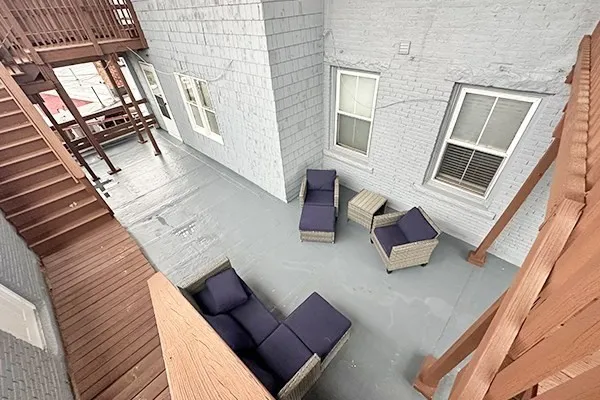a view of living room and wooden floor