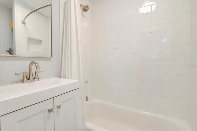 a bathroom with a sink and a bathtub